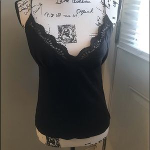 This is a classy little slip top by BeBe